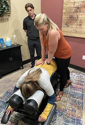 Chiropractor Shawano WI Amy Stuber Adjusting Patient